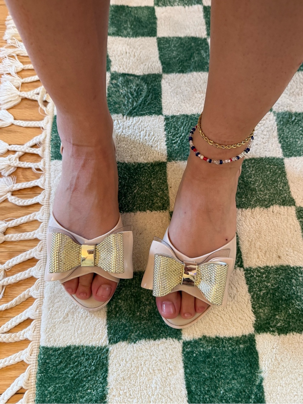 Womens Melissa Cream Slide Sandals with Gold Bow Accent